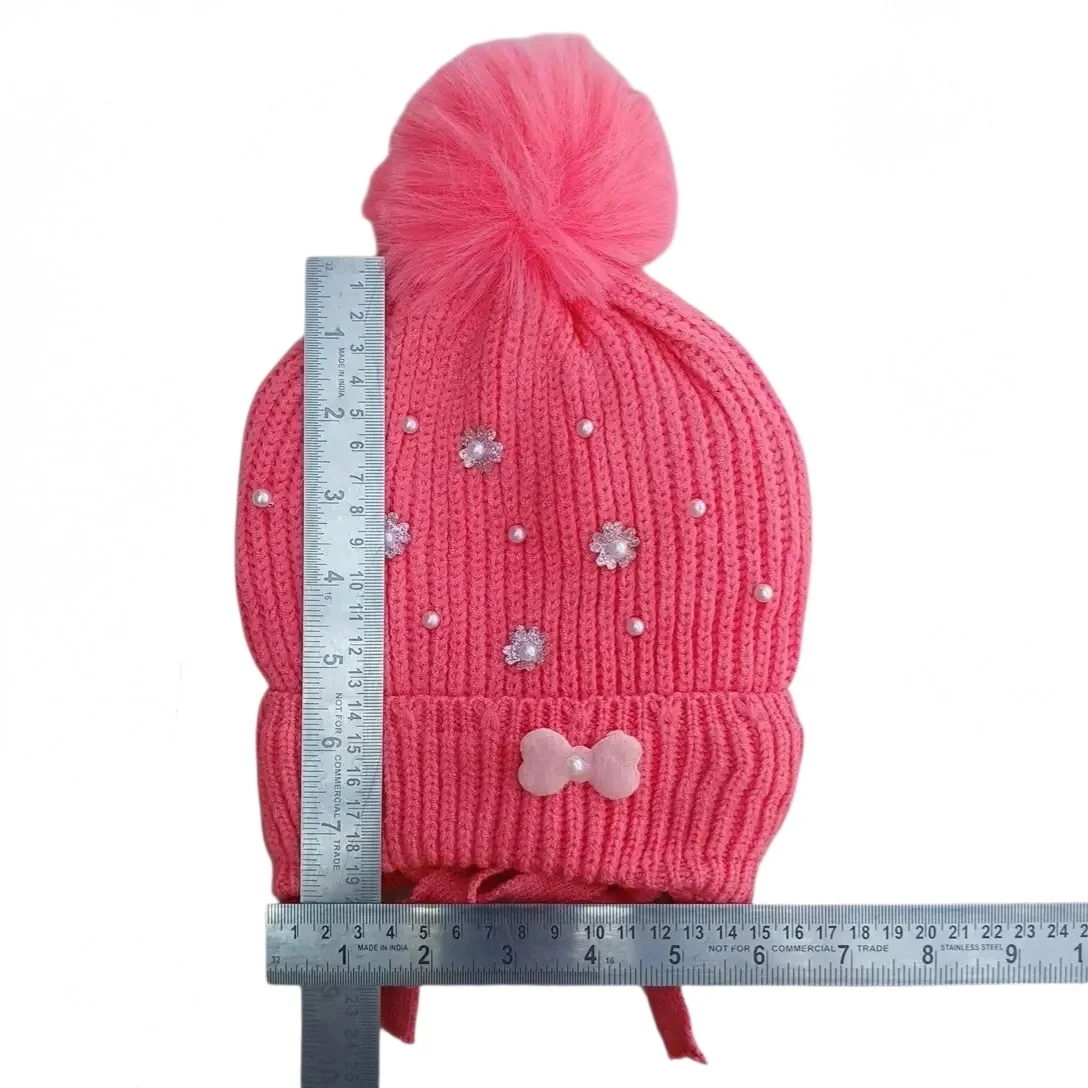 Coral-pink baby winter cap with pom-pom, floral embellishments and pink bow patch size