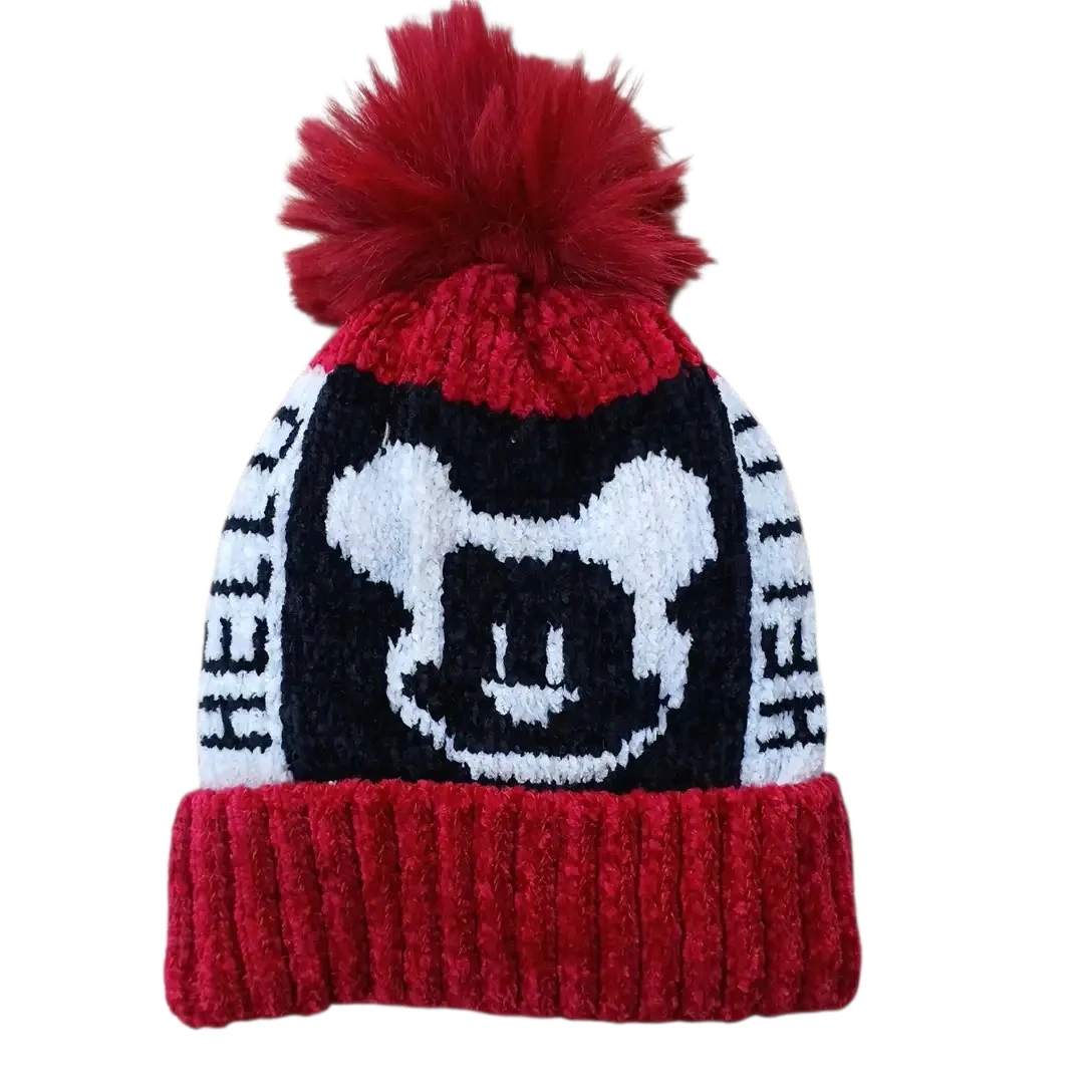 Red, black and white baby winter cap with bear-face pattern and fluffy red pom-pom