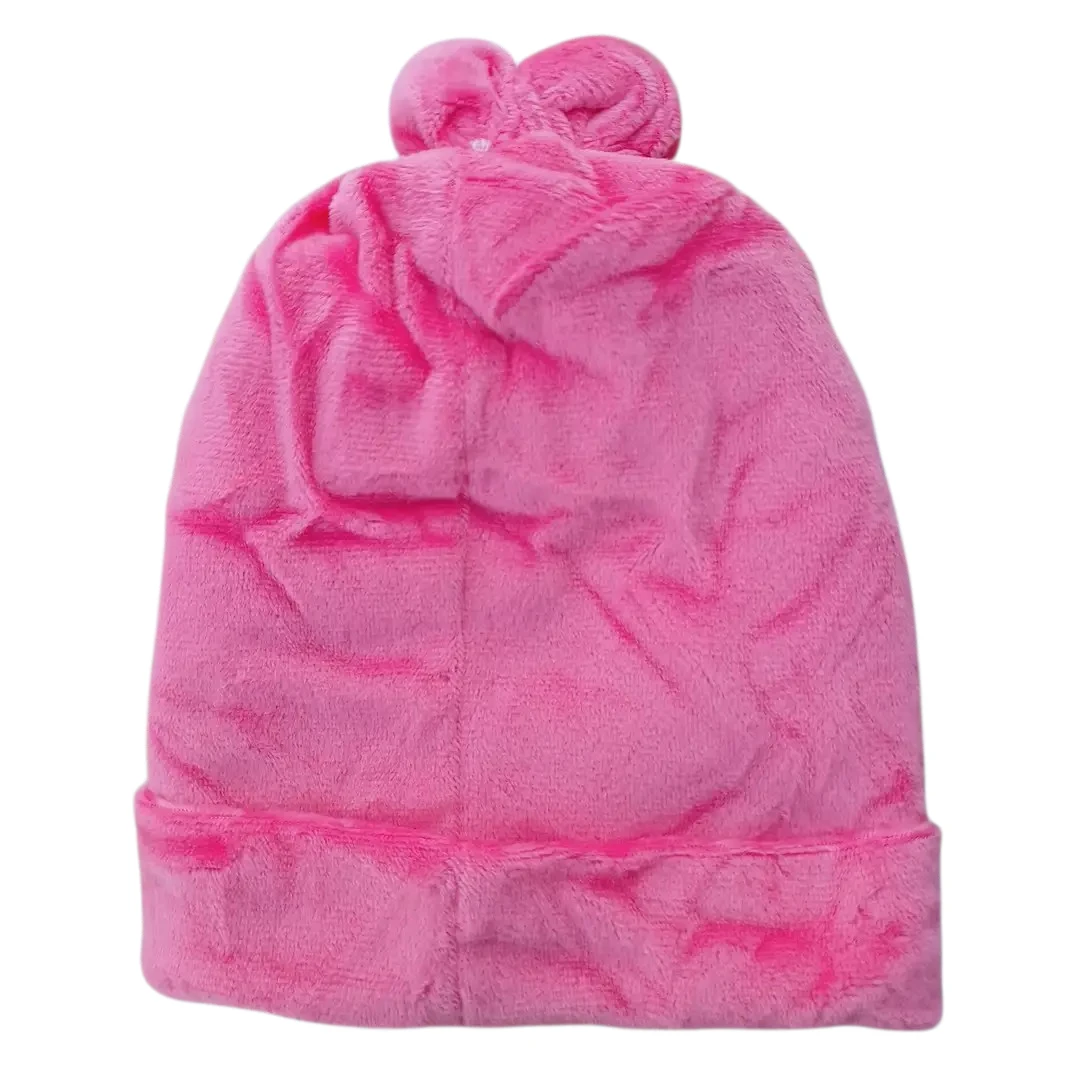 Pink baby winter cap with yellow cartoon face patch and decorative top