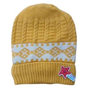 Mustard-yellow baby winter cap with white geometric pattern and colourful starfish patch