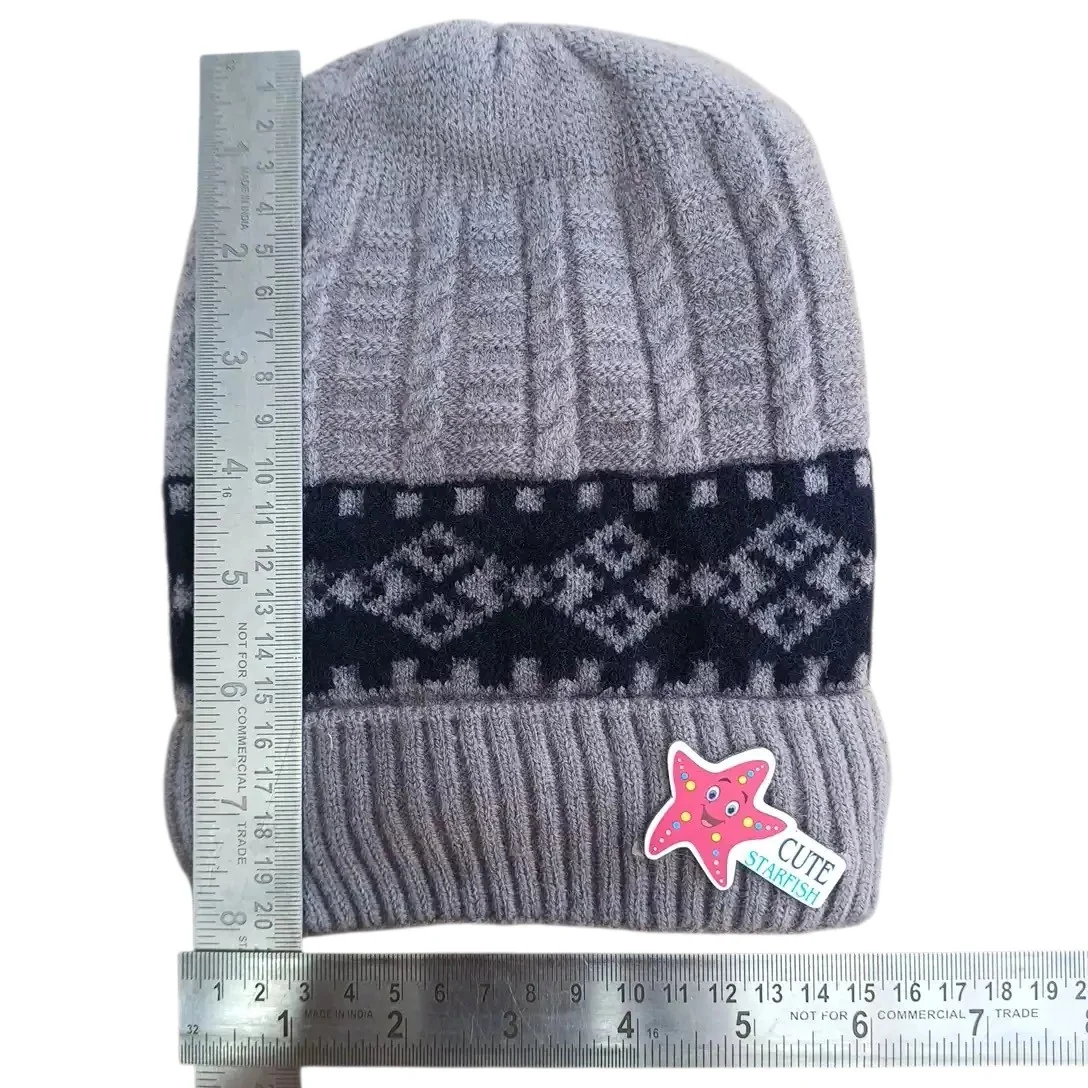 Grey baby winter cap with black geometric pattern and colourful starfish patch size