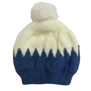 Navy blue and cream baby winter cap with fluffy cream pom-pom and zigzag pattern